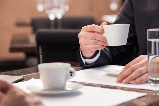 Cheerful manager has an appointment with colleague