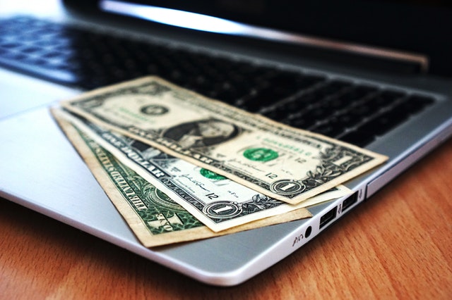 computer-buy-money-banknotes-163056